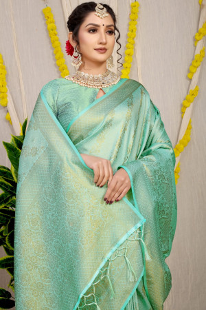 Sea green color soft fancy silk saree with golden zari weaving work