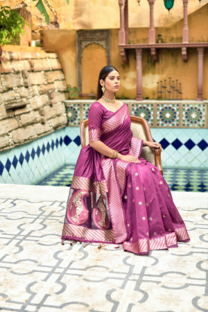 Magenta color linen silk saree with zari woven work