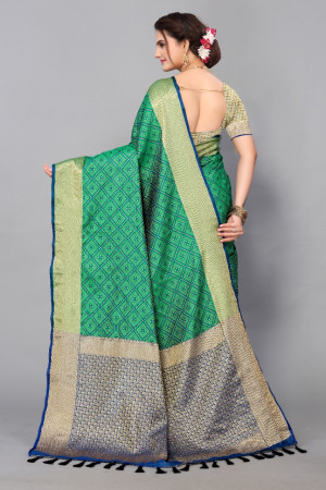 Green color patola silk saree with zari woven work