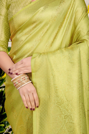 Parrot green color soft fancy silk saree with golden zari weaving work