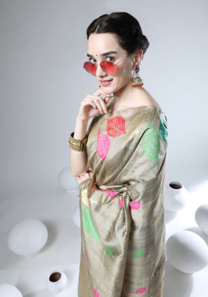 Beige color tussar silk saree with zari woven work