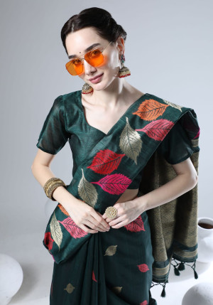 Dark green color tussar silk saree with zari woven work