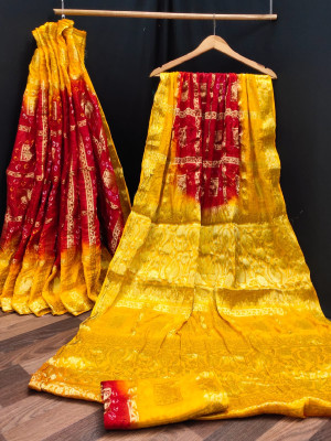 Red and yellow  color bandhej silk saree with zari weaving work