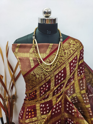Brown and maroon color hand bandhej silk saree with zari weaving work