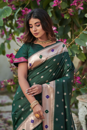 Dark green color soft paithani silk saree with zari weaving work