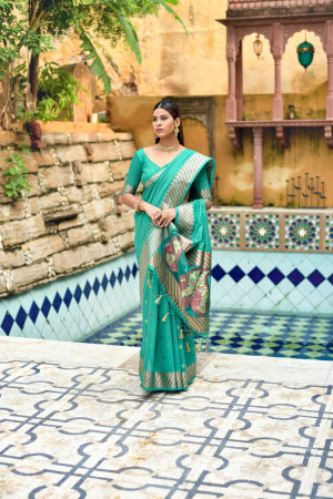 Green color linen silk saree with zari woven work
