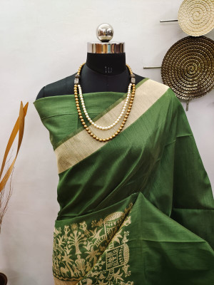 Dark green color raw silk saree with woven work