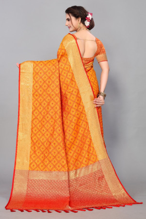 Mustard yellow color patola silk saree with zari woven work