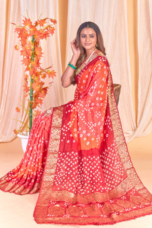 Gajari color bandhej silk saree with zari weaving work