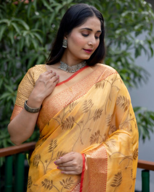 Yellow color linen silk saree with golden zari weaving work