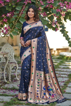 Navy blue color soft paithani silk saree with zari weaving work