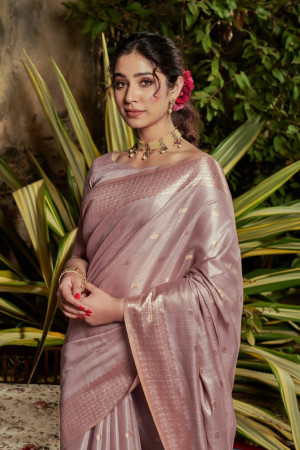 Baby pink color linen silk saree with zari woven work