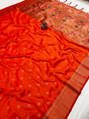 Orange color paithani silk saree with copper zari weaving work