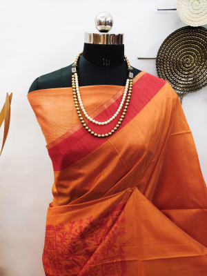Orange color raw silk saree with woven work