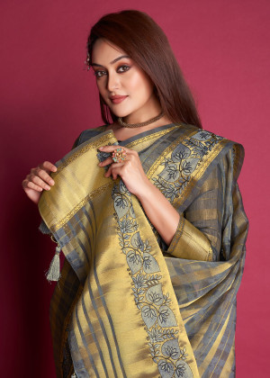 Gray color organza silk saree with embroidered and zari weaving work