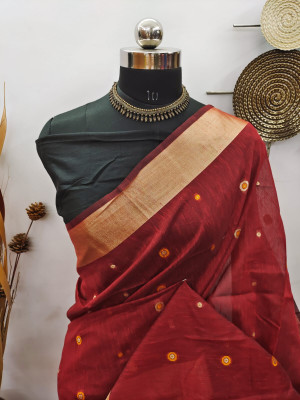 Maroon color raw silk saree with zari woven work
