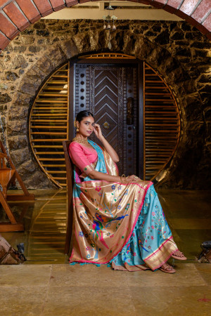 Sky blue color paithani silk saree with zari weaving work