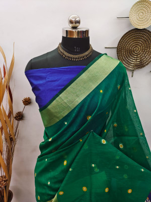 Green color raw silk saree with zari woven work