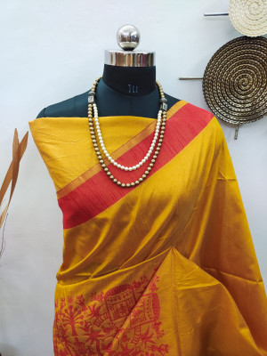 Yellow color raw silk saree with woven work