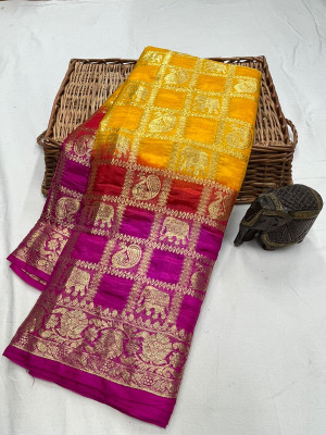Yellow and rani pink color art silk saree with zari weaving work