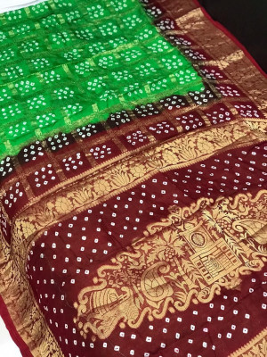 Parrot green and maroon color pure hand bandhej silk saree with zari weaving work