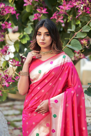 Rani pink color soft paithani silk saree with zari weaving work