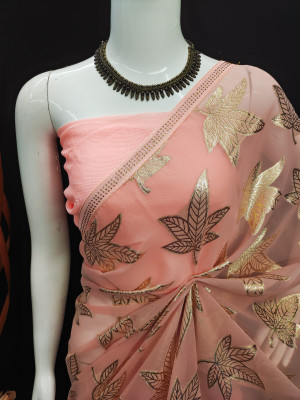 Peach color soft georgette saree with zari weaving work