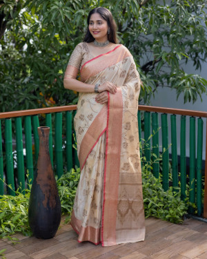 Off white color linen silk saree with golden zari weaving work
