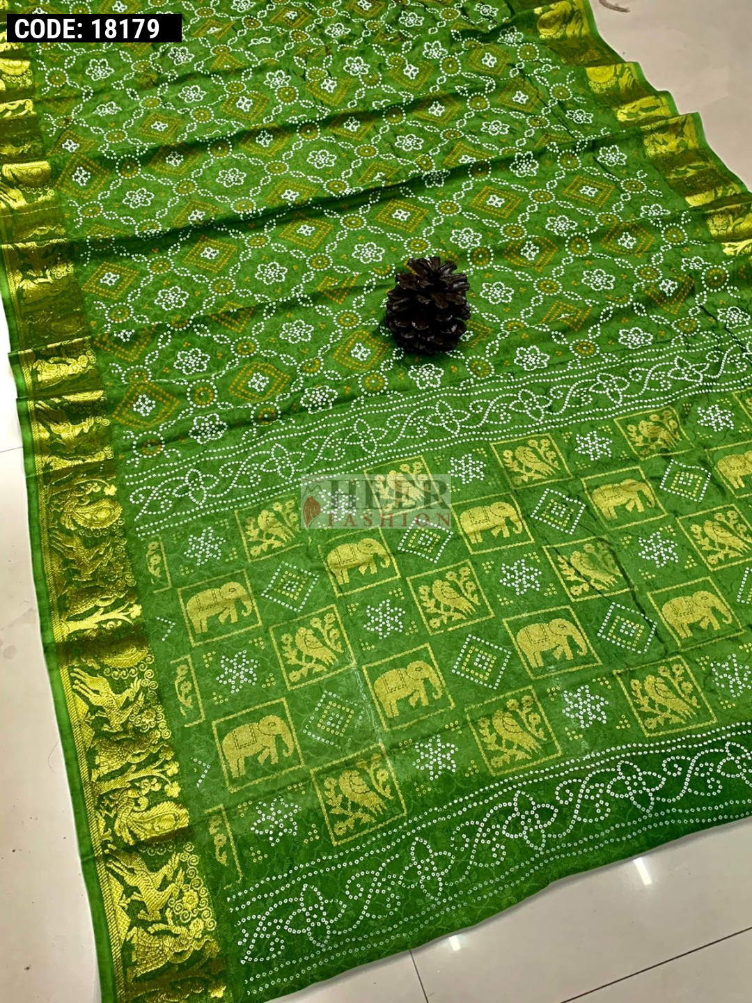 Mahendi green color soft bandhej silk saree with khadi printed work