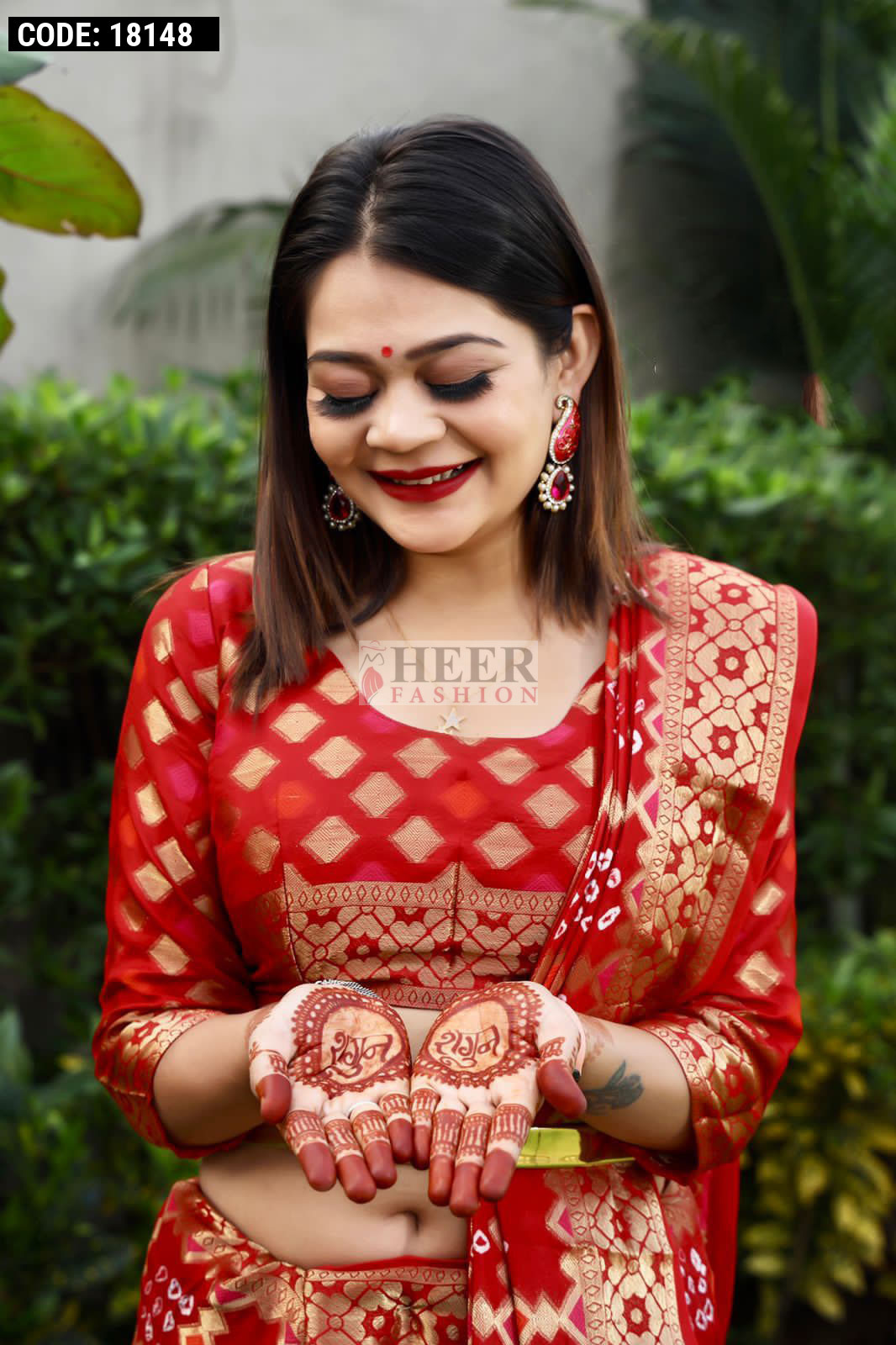 Red color hand bandhej silk saree with zari weaving work