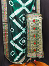 Dark green color soft dola silk saree with zari weaving work