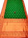 Dark green color soft banarasi saree with zari weaving work