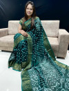 Dark green color bandhani saree with hand bandhej work