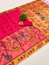 Rani pink color paithani silk saree with zari weaving work