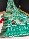 Sea green color soft dola silk saree with laheriya printed work