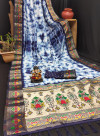 Blue color dola silk saree with sibori printed work