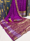 Magenta color bandhani saree with zari weaving work