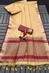 Cream color soft tussar silk saree with zari weaving work