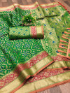 Green color soft patola silk saree with zari weaving work