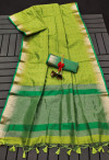 Mahendi green color soft tussar silk saree with zari weaving work