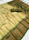 Off white and green color soft silk saree with zari weaving work