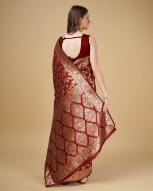 Maroon color pure silk saree with zari weaving work