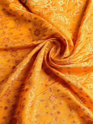 Mustard yellow color patola silk saree with zari weaving work