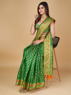 Green color patola silk saree with woven design