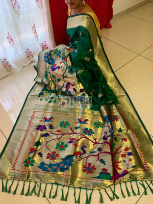 Green color paithani silk saree with zari weaving work