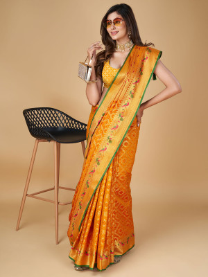 Orange color patola silk saree with woven design