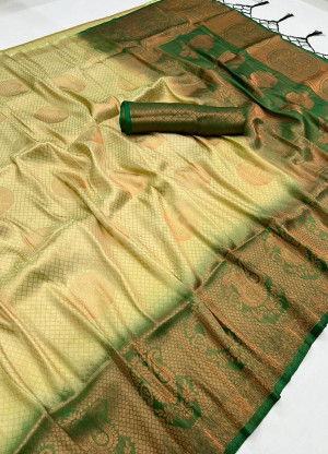 Off white and green color soft silk saree with zari weaving work