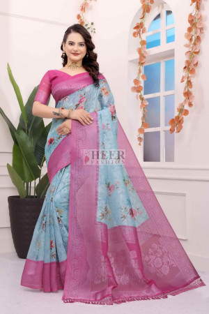 Sky blue floral printed brasso silk saree with zari weaving work