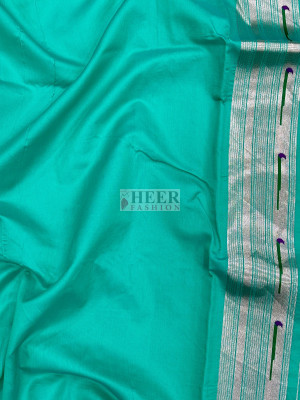 Rama green color kanchipuram silk saree with zari weaving work